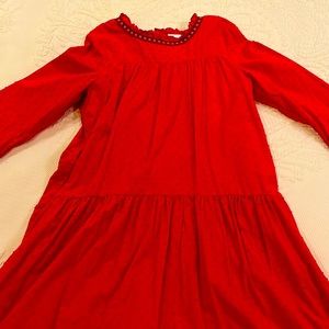 Swiss dot dress in vibrant red with a contrasting trim. Hanna Andersson 10.